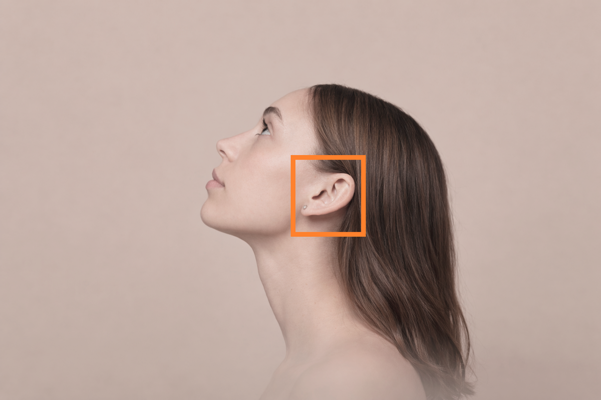 Woman with marked ear
